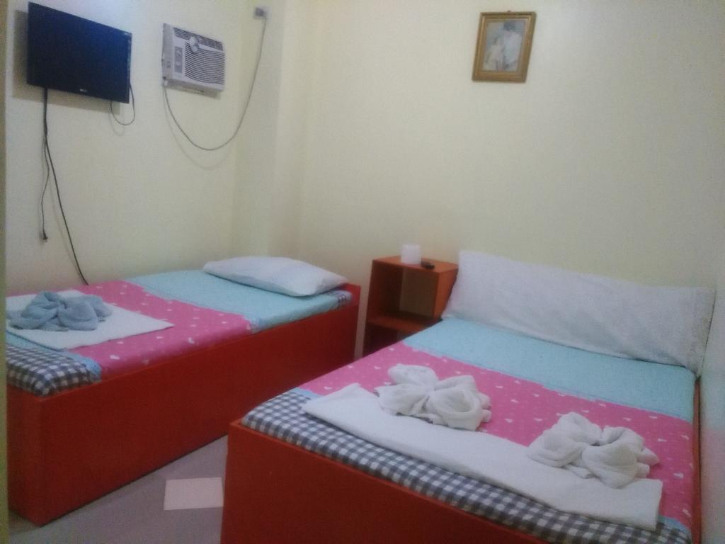 Aranas-Carillo Travellers Inn Калибо Номер фото